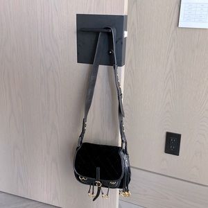 Authentic leather and fabric Prada bad with the authenticity card